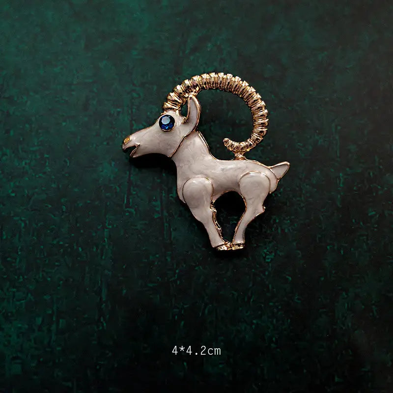 Goat brooch